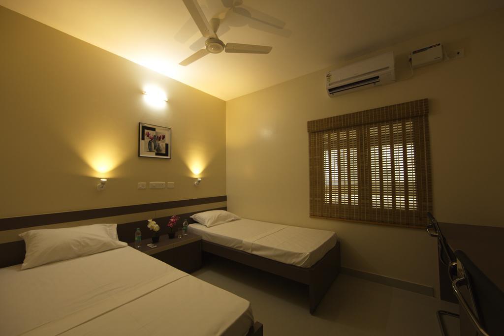 Pearl Guest House Madrás Habitación foto